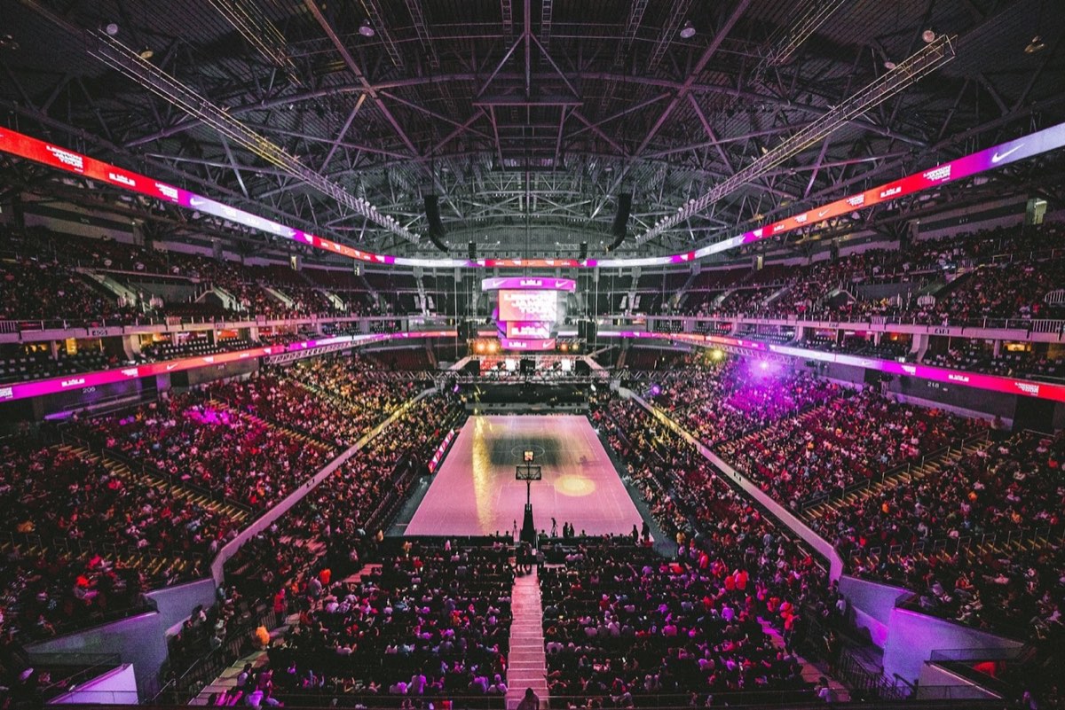 A packed basketball arena mid-game