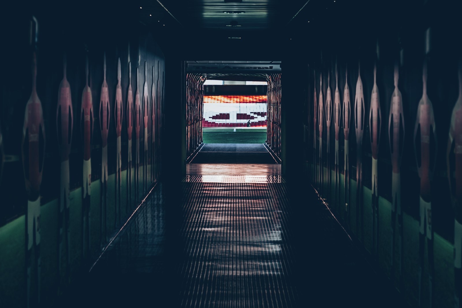 A stadium player tunnel opening onto the field