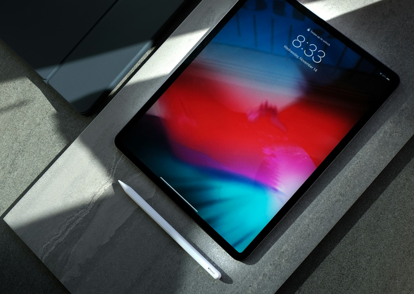 iPad held in hand — the App Store discoverability surface