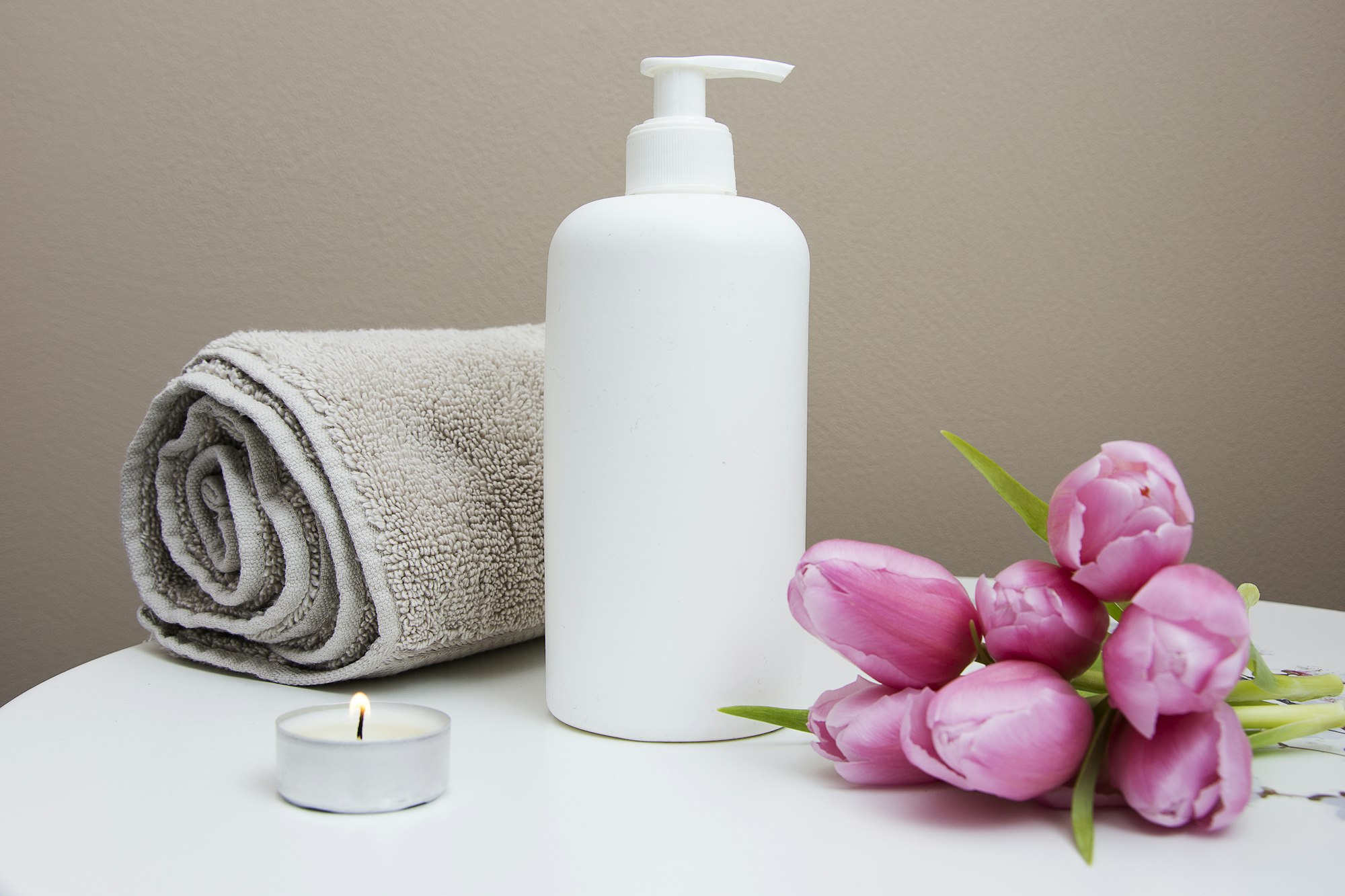 Professional aesthetician working in warm-toned salon
