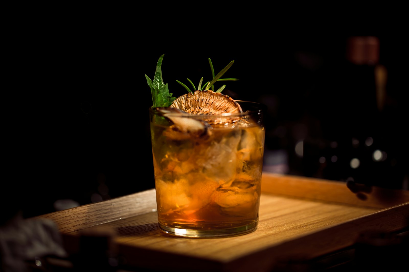 Amber whiskey glass — warm bar context